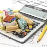 cost calculation image containing calculator, pencil, eraser, blueprint